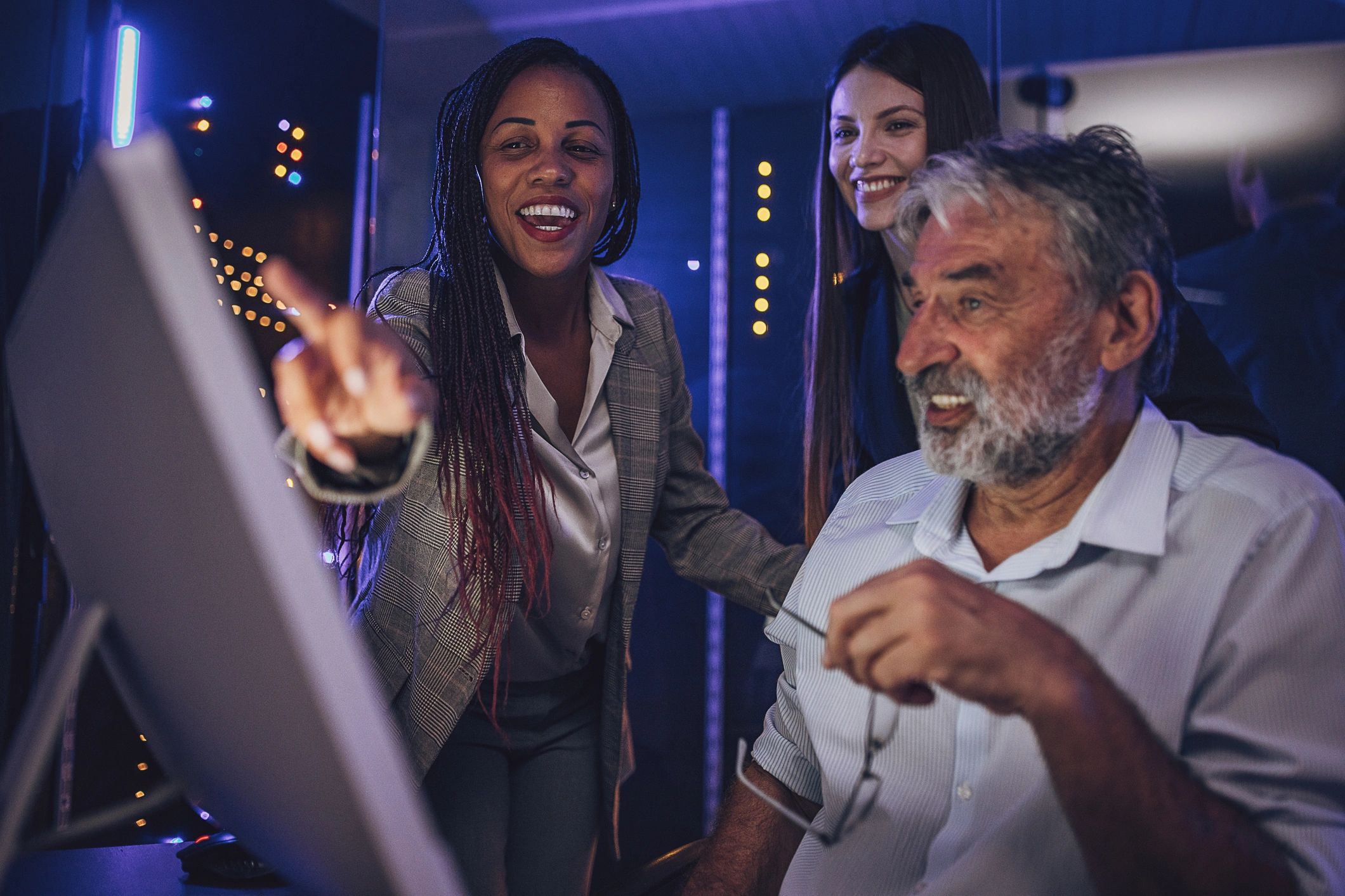 diverse IT professionals working in secure operations center